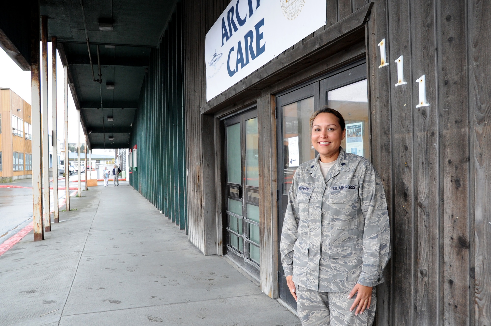 Lt. Col. (Dr.) Joni Scott-Weidemen, an optometrist assigned to the 413th Aeromedical Staging Squadron, Robins Air Force Base, Georgia, stands outside the Arctic Care treatment center in Kodiak, Alaska. (U.S. Air Force photo by Bo Joyner)