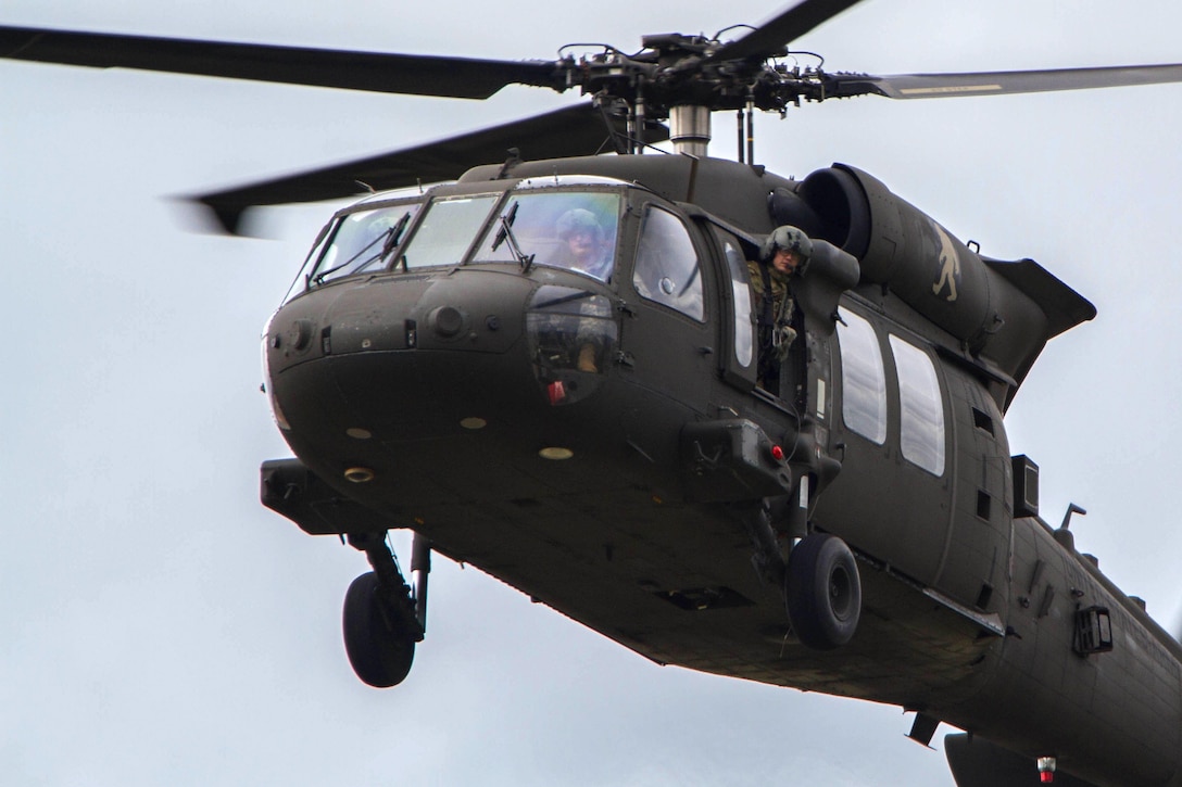 A UH-60 Black Hawk helicopter provides transportation for senior observer controllers during a combined arms live-fire exercise at Joint Base Lewis-McChord, Wash., April 5, 2016. Army photo by Capt. Brian H. Harris