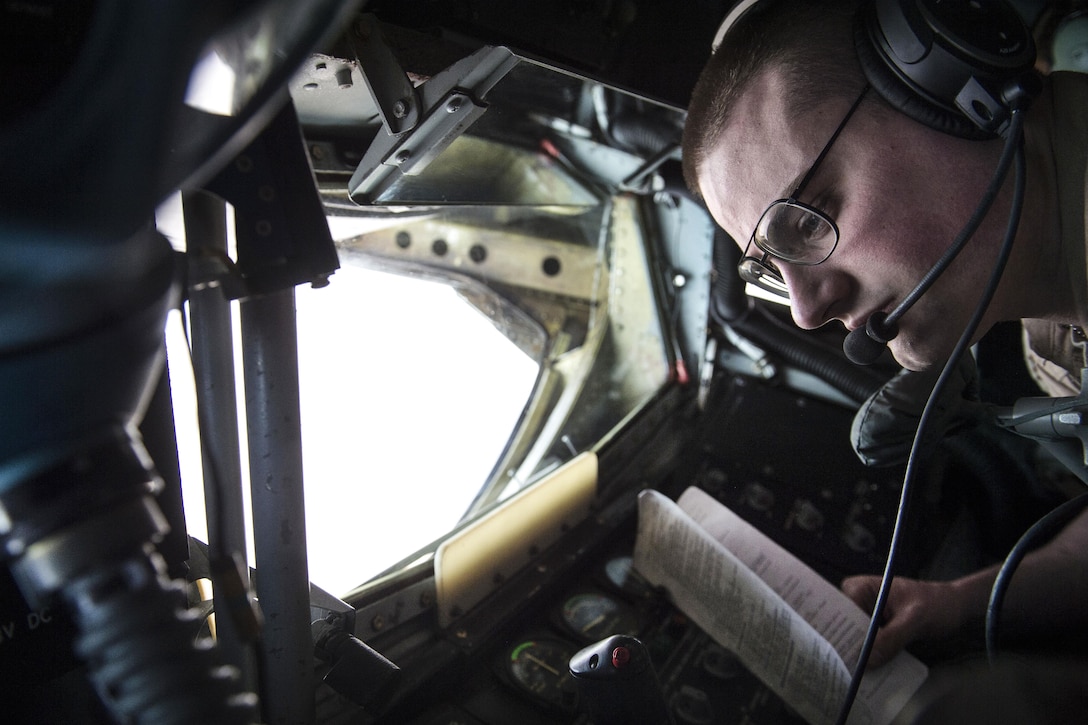 Air Force Staff Sgt. David Avery operates the refueling boom of a KC-135 Stratotanker aircraft in support of Operation Inherent Resolve over Iraq, April 5, 2016. Avery is deployed from the 384th Air Refueling Squadron, McConnell Air Force Base, Kan. Air Force photo by Staff Sgt. Corey Hook