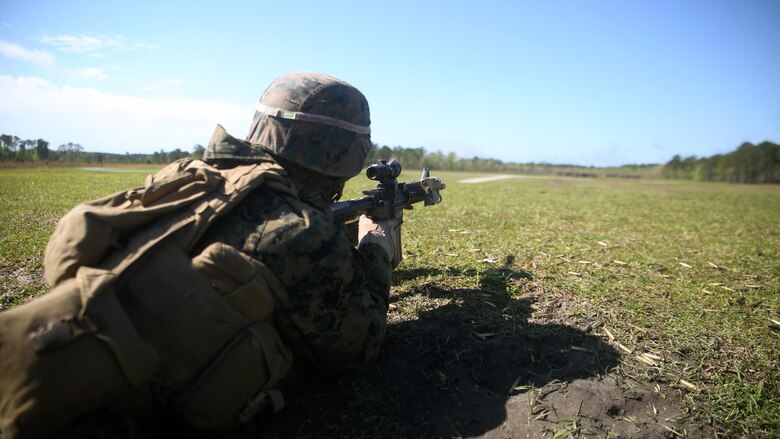 Cpl. Stephen Hill, a scout with 2nd Light Armored Reconnaissance Battalion, prepares to fire at targets during the live-fire portion of the battalion’s annual ‘Isaak’ Competition at Camp Lejeune, N.C., April 7, 2016. The competition offered the scouts a plethora of different scenarios a scout must be able to accomplish, including casualty evacuation, call for fire, unknown distance marksmanship, and land navigation. (U.S. Marine Corps photo by Cpl. Joey Mendez)