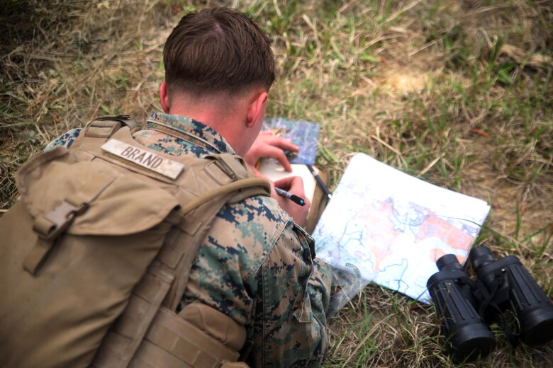 A scout, with 2nd Light Armored Reconnaissance Battalion prepares to execute a call for fire from a notional artillery battery during the battalion’s annual Isaak Competition at Camp Lejeune, N.C., April 5, 2016. The competition offered the scouts a plethora of different scenarios a scout must be able to accomplish, including casualty evacuation, call for fire, unknown-distance marksmanship, and land navigation. (U.S. Marine Corps photo by Cpl. Joey Mendez)