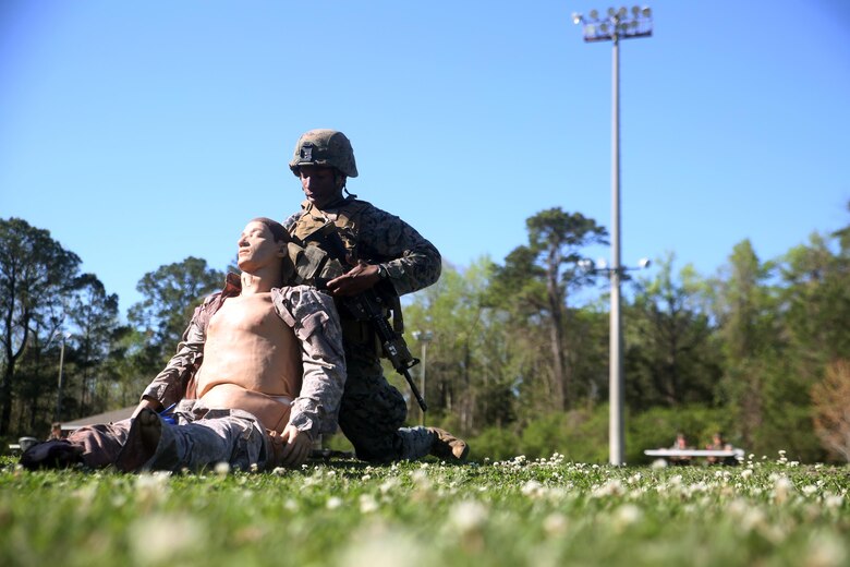 A scout with 2nd Light Armored Reconnaissance Battalion demonstrates his abilities in combat lifesaver skills during the battalion’s annual Isaak Competition at Camp Lejeune, N.C., April 4, 2016. The competition offered the scouts a plethora of different scenarios a scout must be able to accomplish, including casualty evacuation, call for fire, unknown-distance marksmanship, and land navigation. (U.S. Marine Corps photo by Cpl. Joey Mendez)