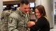 Master Sgt. Joseph Molzen, assigned to the 107th Security Forces Squadron at Niagara Falls Air Reserve Station, N.Y., sees his newborn daughter for the first time. Molzen was one of more than 30 Airmen from the 107th SFS to return from a six-month deployment to Southwest Asia, Feb. 4-5, 2016. (U.S. Air National Guard photo/Staff Sgt. Ryan Campbell)