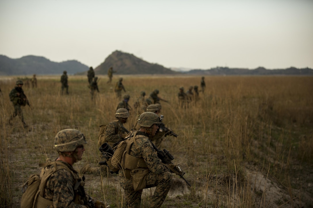U.S. and Philippine Marines conducts a ground assault maneuver during Balikatan 16, at Crow Valley, Philippines, April 9, 2016. U.S. and Philippine Marines trained “shoulder-to-shoulder” after an aerial insert in ground assault maneuvers to build their combined capabilities. Balikatan is an annual Philippines-U.S. military bilateral training exercise that strengthens the Philippine-U.S. alliance and focuses on a variety of missions in response to conflict and crises throughout the Indo-Asia-Pacific region. 
