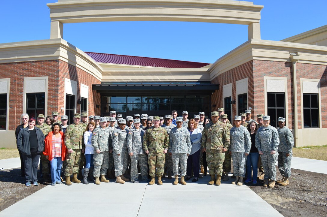 Soldiers with the 108th Training Command and subordinate divisions pose for a picture after completing Family Programs University Training at Fort Bragg, N.C., Feb. 28, 2016. This training provided participants with information relevant to Command teams on the administration of a unit Family Readiness Program.