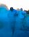 Participants of the Helping Agency 5K have blue chalk thrown at them on Barksdale Air Force Base, La., April 8, 2016. Blue, white, red, teal and orange were the five representational colors of helping agencies taking part in the 5k event. (U.S. Air Force photo/Senior Airman Jannelle Dickey)