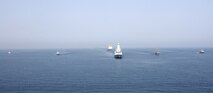 (April 11, 2016) Royal Navy ship HMS Defender and Royal Fleet Auxiliary ship RFA Cardigan Bay anchor a formation of coalition mine countermeasures and maritime security vessels at sea, operating in support of the International Mine Countermeasures Exercise (IMCMEX). IMCMEX includes navies from more than 30 countries spanning six continents training together across the Middle East. The exercise is focused on maritime security from mine countermeasures, maritime infrastructure protection and maritime security operations in support of civilian shipping.