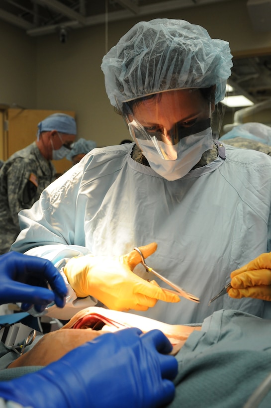 U.S. Army Reserve Sgt. Fuada Kasollja, a Dedham, Massachusetts native and operating room technician with the 399th Combat Support Hospital, 804th Medical Brigade, 3d Medical Command (Deployment Support) sutures a simulated patient during an exercise April 2, 2016 at the Mayo Clinic Multidisciplinary Simulation Center in Rochester, Minnesota. The purpose of the exercise was for the 399th CSH Soldiers to practice the Department of the Defense mandated framework known as Team Strategies and Tools to Enhance Performance and Patient Safety, or TeamSTEPPS. TeamSTEPPS optimizes military medical care by focusing on reducing communication errors that can lead to improper patient care.