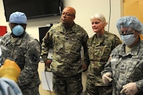 Command Sgt. Maj. Marlo V. Cross, Jr. and Maj. Gen. Mary E. Link, the command team for the Army Reserve Medical Command, observe Soldiers of the 399th Combat Support Hospital, 804th Medical Brigade, 3d Medical Command (Deployment Support) as they conduct an exercise April 2, 2016 at the Mayo Clinic Multidisciplinary Simulation Center in Rochester, Minnesota. The training served as a platform for the unit to practice and implement the Team Strategies and Tools to Enhance Performance and Patient Safety, or TeamSTEPPS, model of patient care. TeamSTEPPS is a framework mandated by the Department of Defense to optimize the performance of military medical teams and reduce communication errors that can lead to improper patient care.