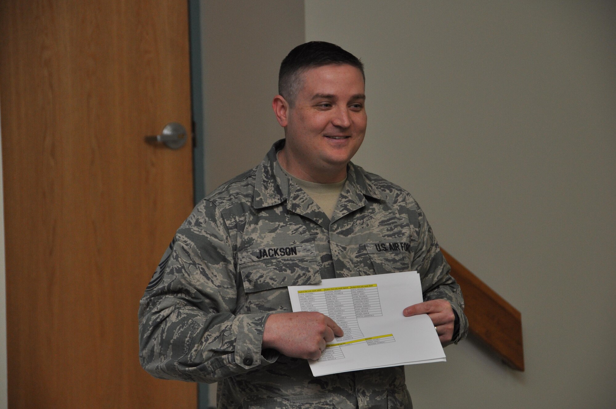 Senior Master Sgt. David Jackson, 512th Force Development chief, explains the benefits of the professional manager certification program at a townhall event April 3, 2016 at Dover Air Force Base, Delaware. The PMC serves as an incentive for noncommissioned officers to enhance their professional development and academic experience. (U.S. Air Force photo/Staff Sgt. Joe Yanik)