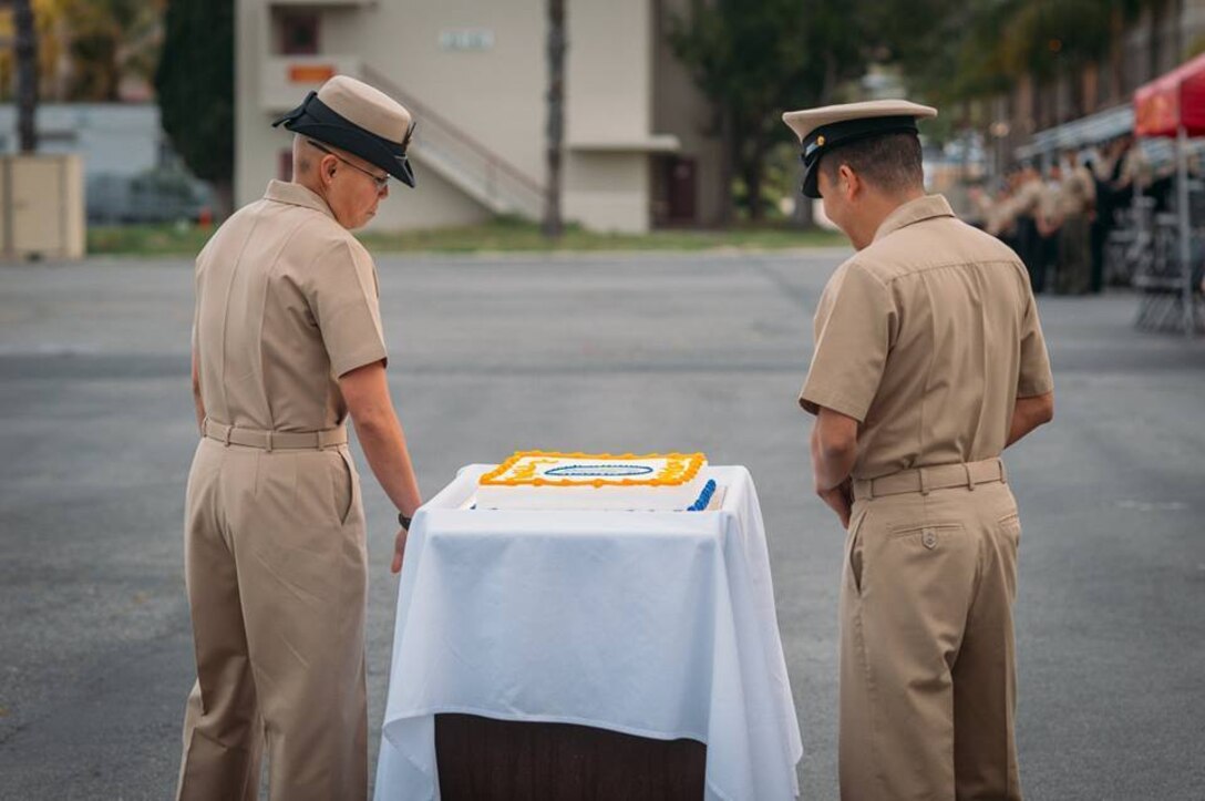 U.S. Navy Chief Petty Officers with 1st Medical Battalion, 1st Marine Logistics Group, prepare to serve a ceremonial cake during the U.S. Navy Chief Petty Officer 123rd birthday cake-cutting ceremony aboard Camp Pendleton, Calif. April 1, 2016. The battalion provides health service support to the operating units of I Marine Expeditionary Force to reach full mission accomplishment. (U.S. Marine Corps photo by Sgt. Laura Gauna/released)