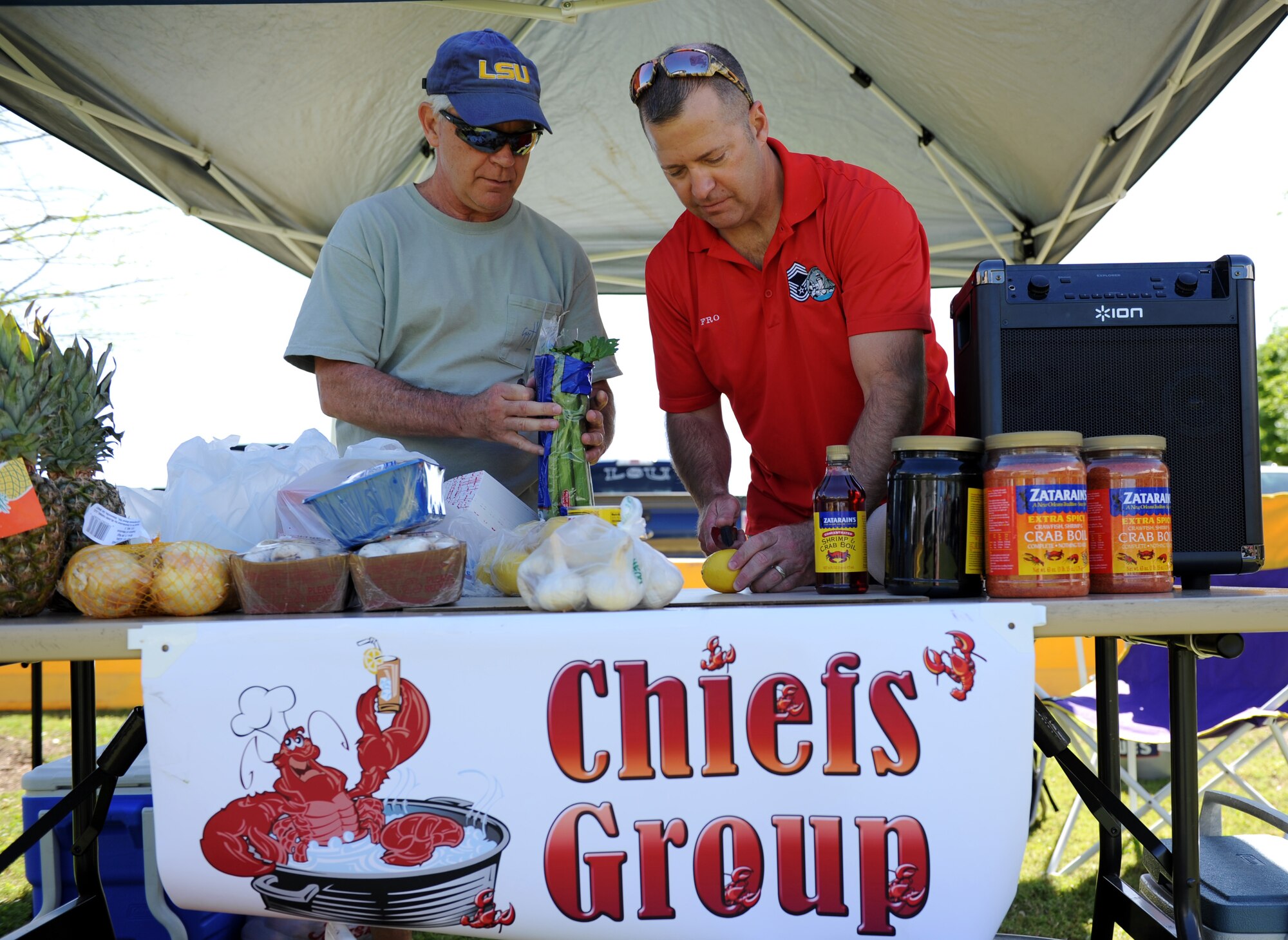 The “Chiefs Group” team members, Mike Gulino 338th Training Squadron course development manager, and Chief Master Sgt. Derek Fromenthal, 338th TRS superintendent, prepare the ‘fixins’ for their crawfish during the 4th Annual Bay Breeze Crawfish Cook-Off at the Bay Breeze Event Center April 8, 2016, Keesler Air Force Base, Miss. The “Bug Smugglers” won the cook-off and decided to gift the trophy and the prize to the second place team, “Kajun Perfection”. “Kajun Perfection” will receive a free entry into the 24th Annual Mississippi Coast Coliseum Crawfish Festival Cook-Off. (U.S. Air Force photo by Kemberly Groue)