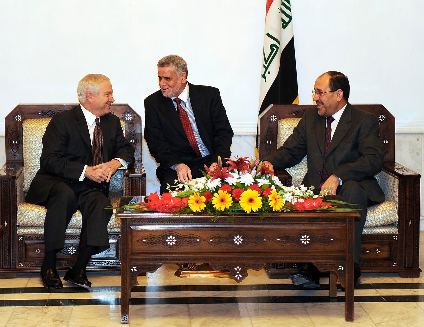Secretary of Defense Robert M. Gates, left, talks with Iraqi Prime Minister Nouri al-Maliki, right, during a meeting in Baghdad, Iraq, Dec. 11, 2009. (DoD photo by Master Sgt. Jerry Morrison, U.S. Air Force/Released) 