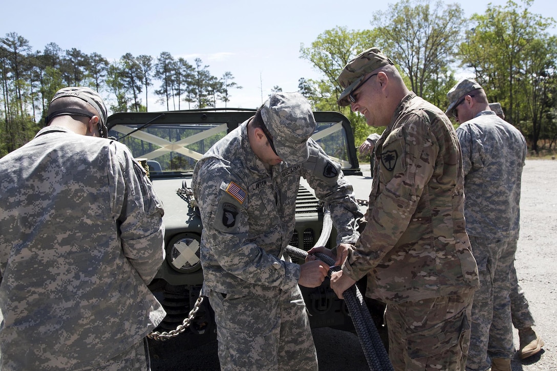 Soldiers prepare a Humvee before participating in slingload training at Clarks Hill Training Site at Plum Branch, South Carolina, April 2, 2016. The soldiers are assigned to the South Carolina Army National Guard’s Company B, 2nd Battalion, 238th Aviation Battalion. South Carolina Army National Guard photo by Capt. Brian Hare