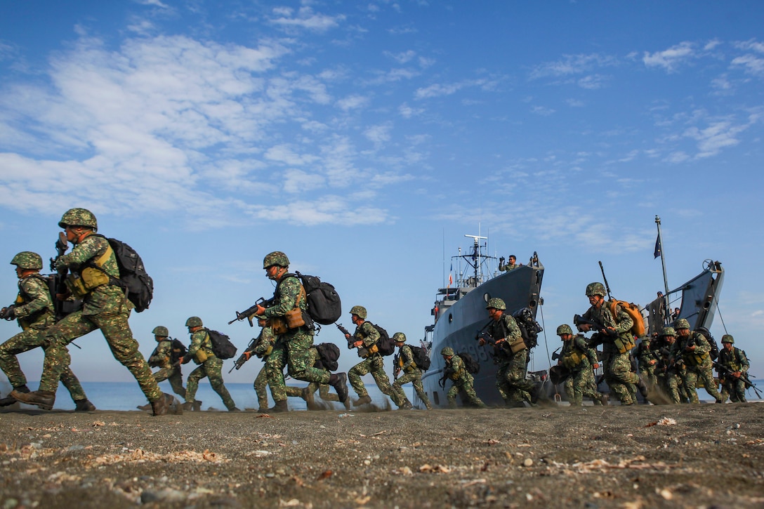 U.S. and Philippine Marines conduct an amphibious landing using Philippine logistical navy ships as part of Exercise Balikatan 2016 in Antique, Philippines, April 11, 2016. The annual bilateral training exercise aims to improve the ability of Philippine and U.S. military forces to work together during planning, contingency and humanitarian assistance and disaster relief operations. Marine Corps photo by Cpl. Hilda M. Becerra