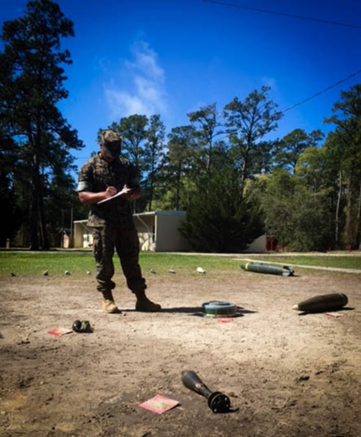 On April 6, 2016 Second Lieutenant Eric Johnson, a Marine attached to Combat Engineer Officer's course 3-16 (CEO 3-16); practices identifying the characteristics of different explosive hazards during an Identification of Explosive Hazards class. The officers are required to be able to identify different characteristics of hazards placed in front of them without the aid of any reference. 
