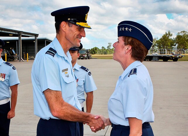 Gen. Lori Robinson, Pacific Air Forces commander, is greeted by Senior Australia Defence Forces Officer, Air Commodore Scott Winchester, upon her arrival at Royal Australian Air Force Base Amberley, March 10, 2016. The visit to RAAF Base Amberley was part of Robinson’s two-week visit to New Zealand and Australia, which served to improve relations with both nations and reaffirmed PACAF’s commitment to the rebalance in the Pacific.