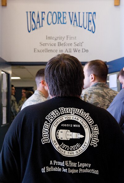 A Propulsion Flight legacy celebration attendee stands in the food line, March 25, 2016, on Dover Air Force Base, Del. Over 200 current and former Propulsion Flight workers consisting of U.S. Air Force active duty and retirees, Reservists, Air Reserve Technicians, Civil Service employees, contract field team members and their family members, attended the celebration ceremony. (U.S. Air Force photo/Roland Balik)