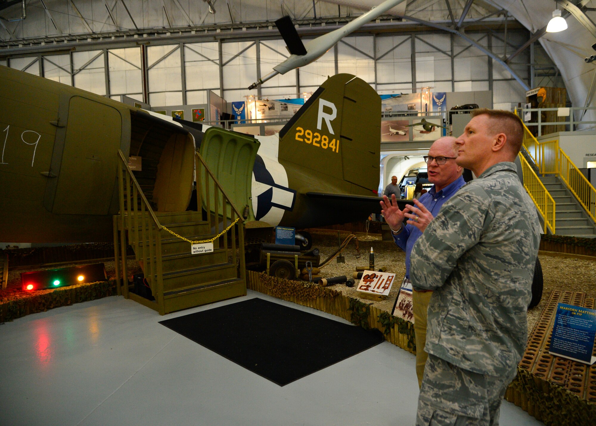 Mike Leister, Air Mobility Command Museum director, shows Col. Michael Grismer, 436th Airlift Wing commander, recently completed restoration projects on a C-47A Skytrain “Turf & Sport Special” while visiting the AMC Museum March 30, 2016, at Dover Air Force Base, Del. One of the new additions to the aircraft are the original colored lights seen in the mirror in the photo (U.S. Air Force photo/Senior Airman William Johnson)