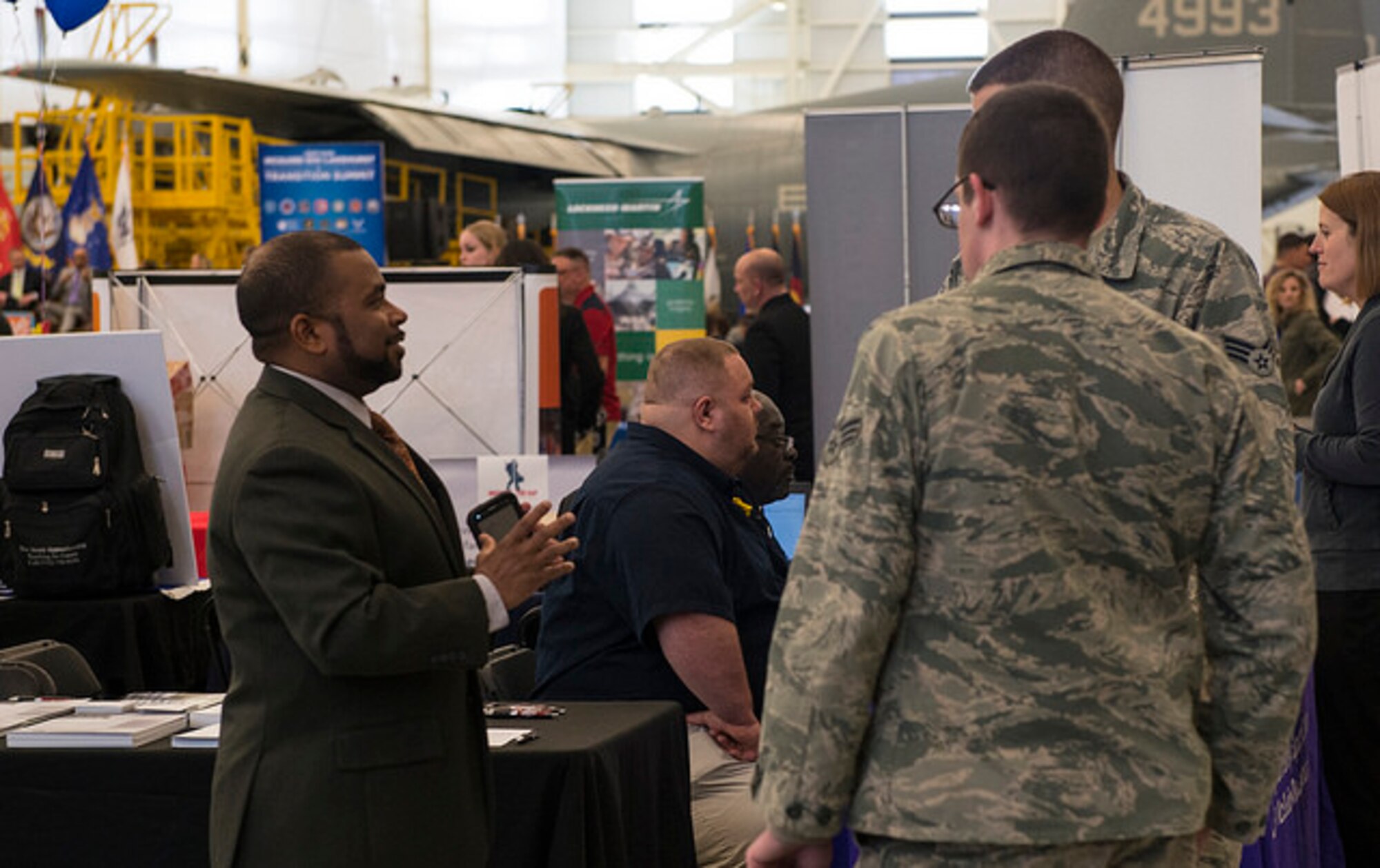An employer talks with transitioning Airmen at the 2016 Veterans Career Summit on Joint Base McGuire-Dix-Lakehurst, N.J. April 9. Over 200 employers and 500 transitioning veterans attended the event. (U.S. Air Force photo by Senior Airman Joshua King)