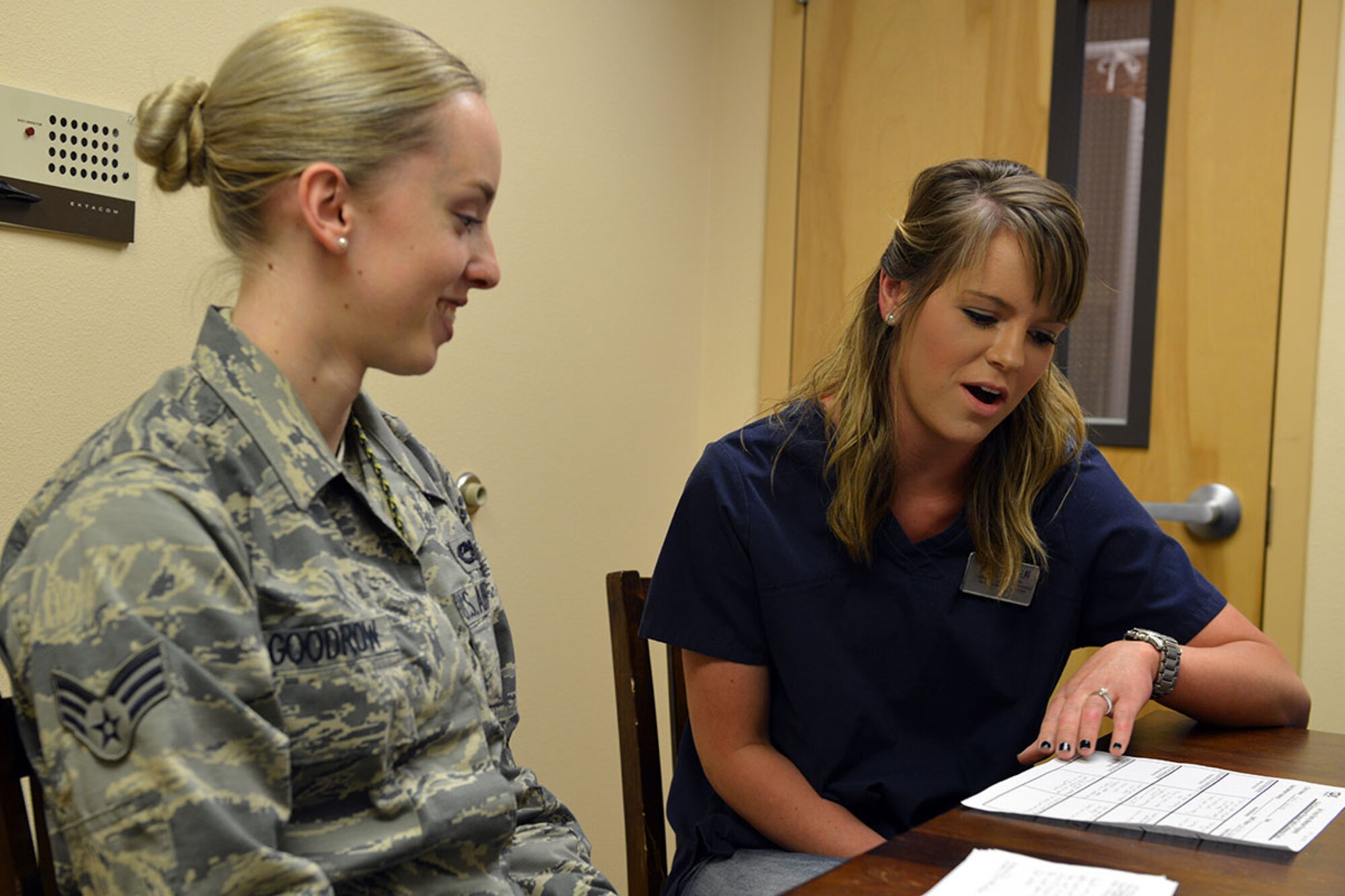 Senior Airman Jenise Goodrow, 3rd Maintenance Squadron low observable journeyman, participates in a parent conference with Mackenzie Rivera, Denali Child Development Center child and youth program assistant, at the Denali CDC, on Joint Base Elmendorf-Richardson, Alaska, April 6, 2016. CDCs host parent conferences twice a year in the spring and fall, however, conferences can be scheduled outside of these times. (U.S. Air Force photo by Airman 1st Class Javier Alvarez)