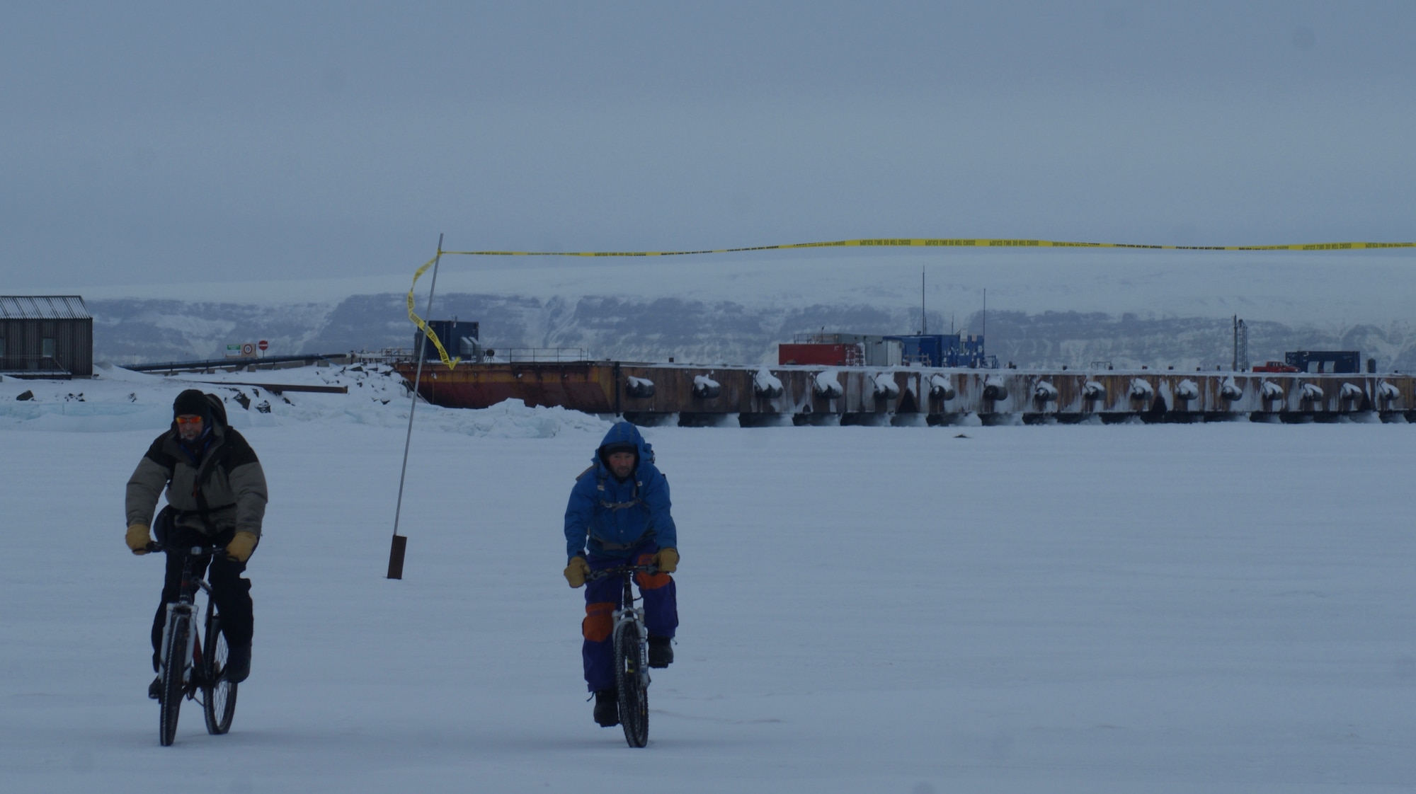 THULE AIR BASE, Greenland – Visitors from the National Science Foundation test the ice in North Star Bay during the Armed Forces Day celebration.  (U.S. Air Force Photo by Master Sgt. Stoney Bair)