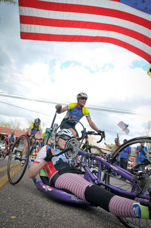 Staff Sgt. Velette Webb, 21st Dental Squadron, is pushed by former Olympian bicyclist Wayne Stetina during the Gulf Coast Challenge Ride 2 Recovery event. Webb was a support rider in an R2R event in 2015, then in March after becoming paralyzed in a mountain biking accident. (Courtesy photo)