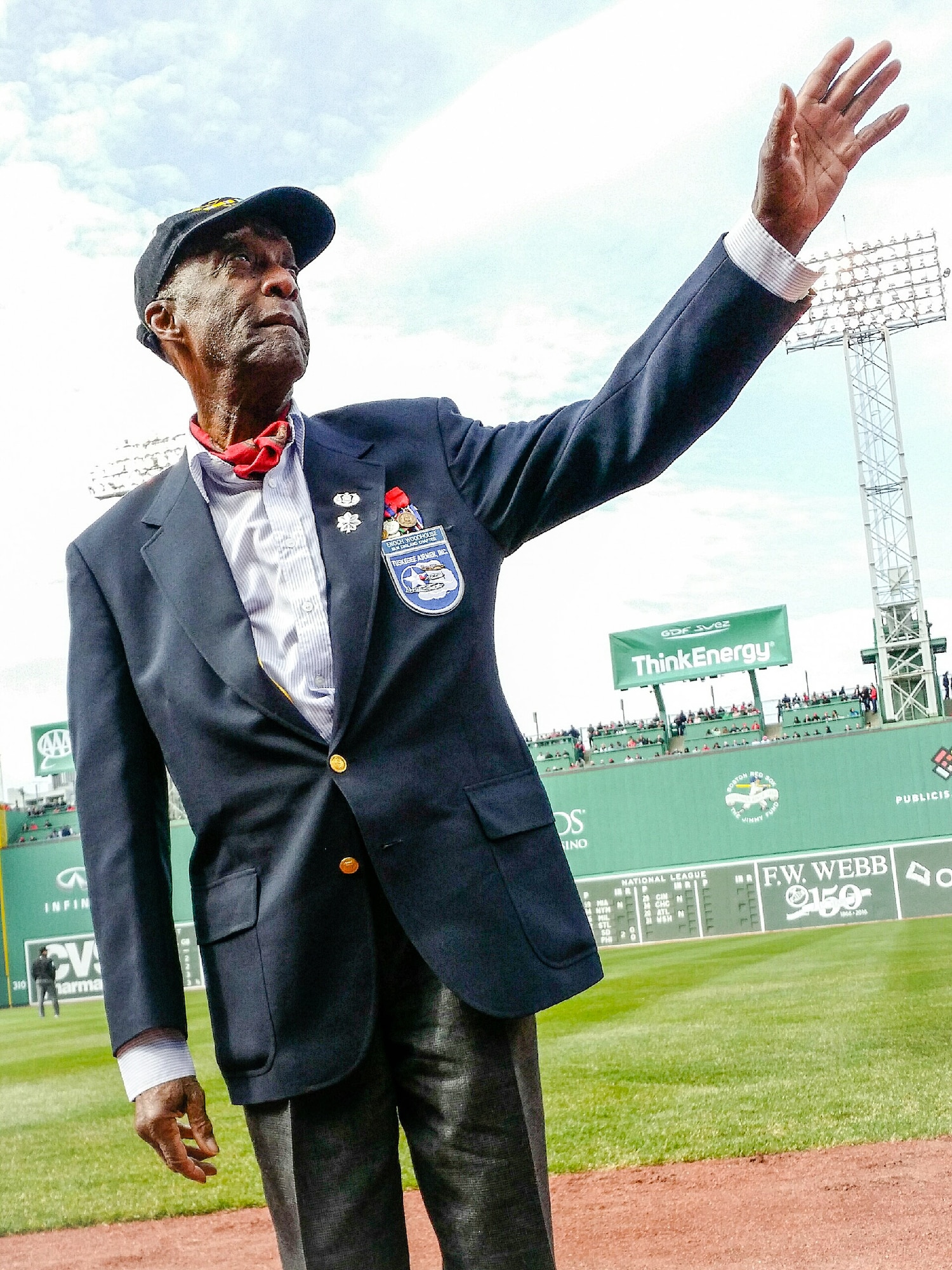 BOSTON -- Retired U.S. Air Force Lt. Col. Enoch Woodhouse III, an original member of the Tuskegee Airmen, is honored during a Boston Red Sox game at Fenway Park April 11. Woodhouse, who joined the U.S. Army Air Corps in 1946, was recognized during the game as part of the team's Hats Off to Heroes program that recognizes military service.  (U.S. Air Force photo by Mark Herlihy)