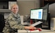 Senior Airman Kelsey Janckila poses for a photo at her desk at the 148th Fighter Wing April 10, 2016.  Janckila, a member of the logistics squadron command support staff, plans to graduate in the fall of 2016 with a degree in communications.  (U.S. Air National Guard Photo by Tech. Sgt. Scott G. Herrington/Released)