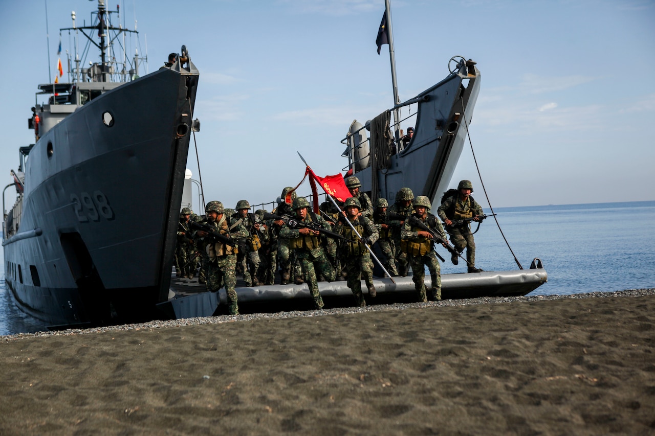 Philippine marines with the Joint Rapid Reaction Force (JRRF), conduct an amphibious landing utilizing Philippine logistical navy ships to seize a scenario-based objective as part of Exercise Balikatan 2016, in Antique, Philippines, April 11, 2016. The JRRF, compiled of U.S. and Philippine forces, have worked together during the exercise to test their capabilities, maintain a high level of interoperability and to enhance combined combat readiness. Balikatan, which means "shoulder to shoulder" in Filipino, is an annual bilateral training exercise aimed at improving the ability of Philippine and U.S. military forces to work together during planning, contingency and humanitarian assistance and disaster relief operations.