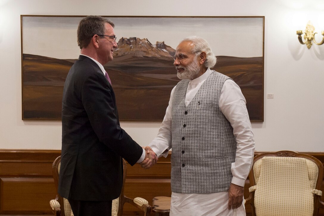 Defense Secretary Ash Carter, left, shakes hands with Indian Prime Minister Narendra Modi as Carter arrives at the prime minister's residence to discuss matters of mutual importance in New Delhi, April 12, 2016. DoD photo by Air Force Senior Master Sgt. Adrian Cadiz