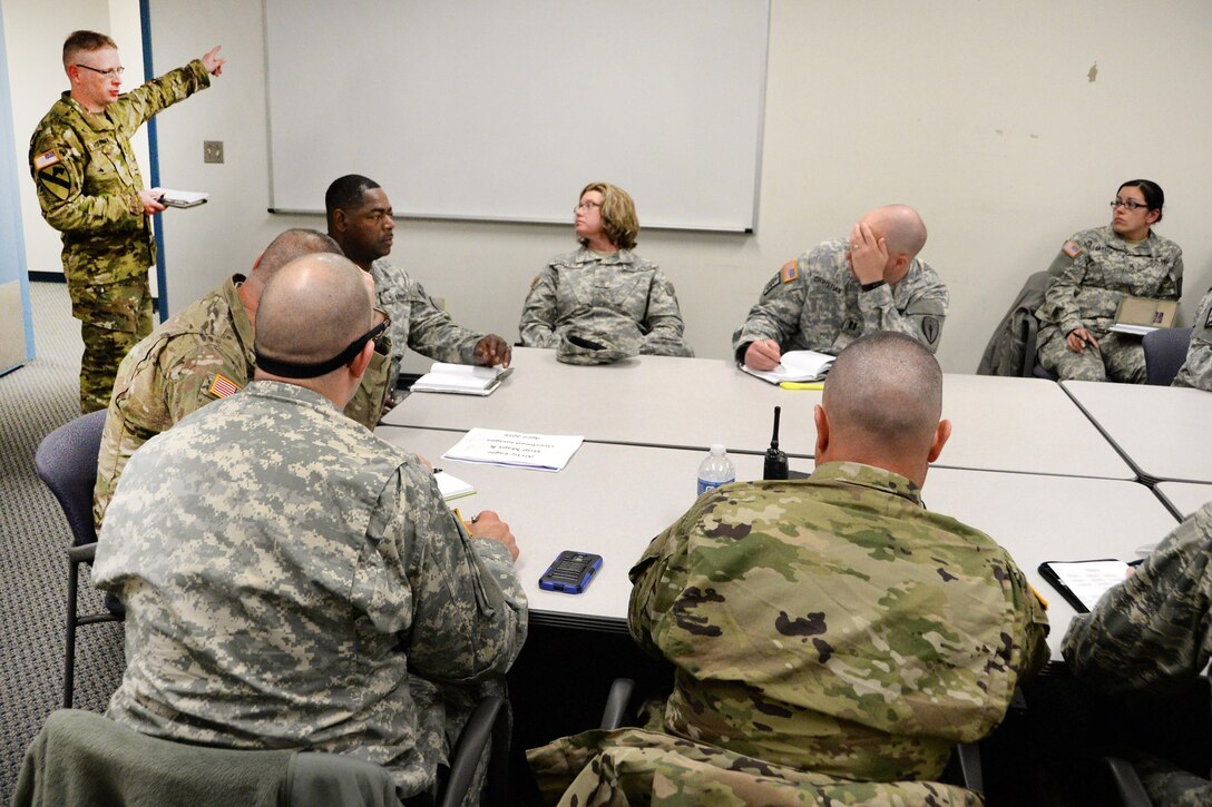 Key leaders review the logistics for the cold weather exercise Operation Arctic Eagle at Camp Grayling, Mich., April 3, 2016. The troops are assigned to the Indiana Air National Guard’s 181st Intelligence Wing and the 81st Troop Command. Arctic Eagle 2016 is a National Guard led, joint, interagency, intergovernmental, and multinational exercise. Indiana Air National Guard photo by Airman 1st Class Kevin D. Schulze