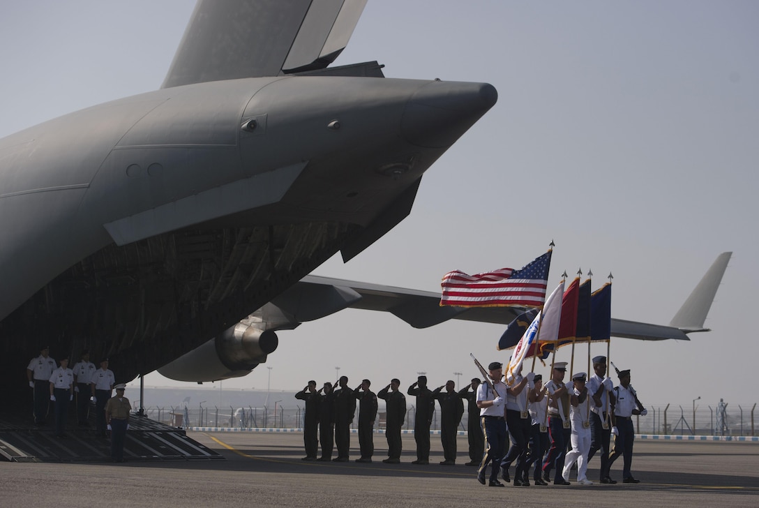 U.S. service members assigned to the Defense POW/MIA Accounting Agency conduct a repatriation ceremony in New Delhi, April 13, 2016, to mark the return of possible remains of U.S. service members lost in World War II. Defense Secretary Ash Carter attended the ceremony during his visit to India. DoD photo by Air Force Senior Master Sgt. Adrian Cadiz
