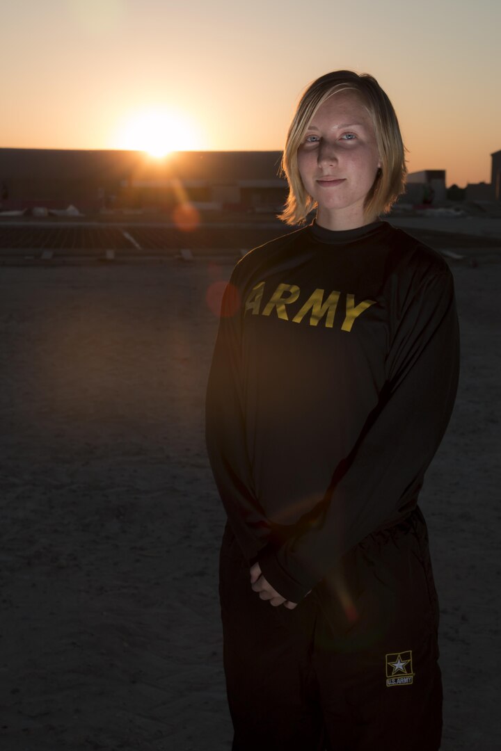 California Army National Guard Sgt. Cassandra Peel, an avionic mechanic in Company B, 640th Aviation Support Battalion, 40th Combat Aviation Brigade, practices taekwondo kicks at Camp Buehring, Kuwait, April 2, 2016. Peel has practiced taekwondo for six years and is now a second degree black belt.