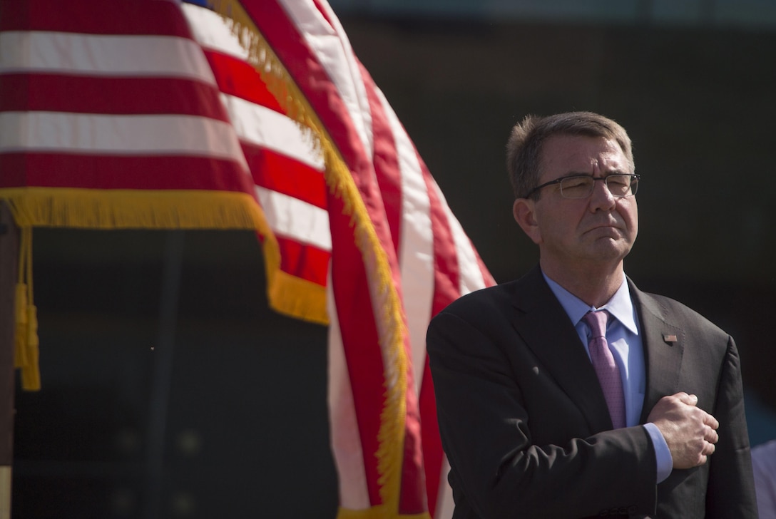 Defense Secretary Ash Carter renders honors during a repatriation ceremony in New Delhi, April 13, 2016, to mark the return of possible remains of U.S. service members lost in World War II. DoD photo by Air Force Senior Master Sgt. Adrian Cadiz