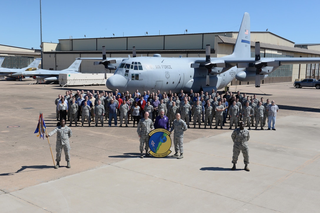 Leadership and instructors for the 365th Training Squadron pose in front of a C-130 on the ground instruction training aircraft ramp at Sheppard Air Force Base, Texas, March 25, 2016. The 365th TRS received the 2016 Training Squadron of the Year award from Brig. Gen. Patrick Doherty, 82nd Training Wing commander.