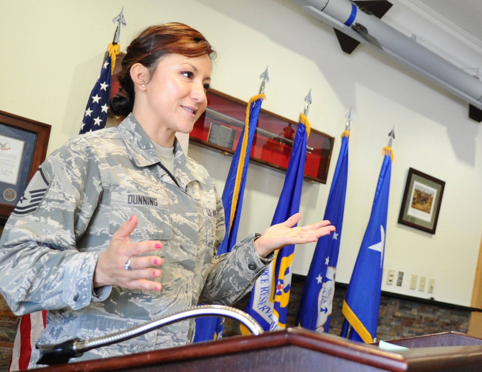 Master Sgt. Martha Dunning, AFNORTH standards and evaluations manager, briefs AFNORTH members April 4 at the Killey Center for Homeland Operations. Dunning is the units Combined Enlisted Association president. She has served as the manager of the 601st Air Operations Center Color Guard Team and as a member of the Tyndall Honor Guard Team.