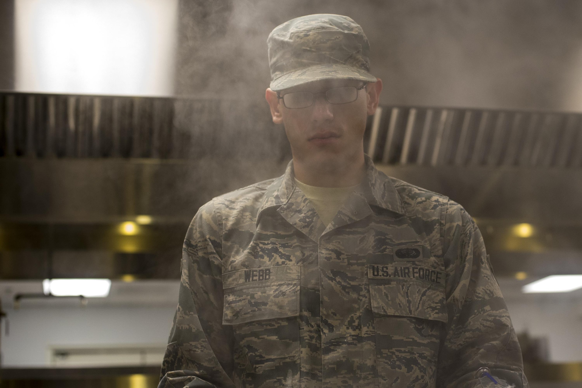 U.S. Air Force Airman 1st Class Jonathan Webb, 23d Force Support Squadron food service specialist, prepares food, April 7, 2016, at Moody Air Force Base, Ga. The Georgia Pines Dining Facility has served over 55,000 meals since opening in November 2015. (U.S. Air Force photo by Airman Daniel Snider/Released)