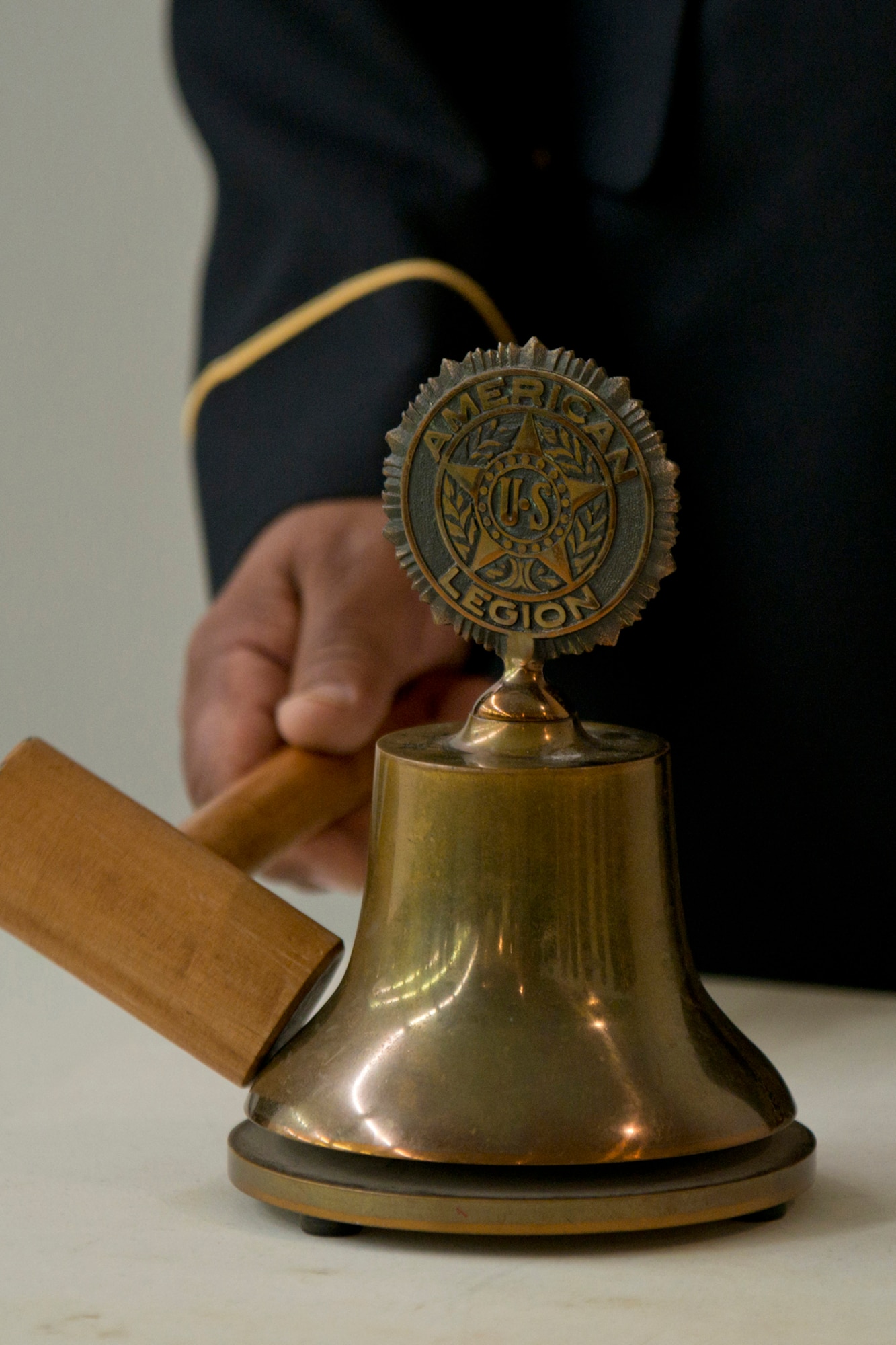 A bell is tapped during the Roll Call of Fallen Heroes during the 11th Annual Tribute to Fallen Heroes Ceremony in Sherwood, Ark., Apr. 9, 2016. The annual ceremony honors the memory of all Arkansans whom made the ultimate sacrifice as a result of the war against terrorism. The bell rang a total of 138 times. (U.S. Air Force photo by Master Sgt. Jeff Walston/released) 