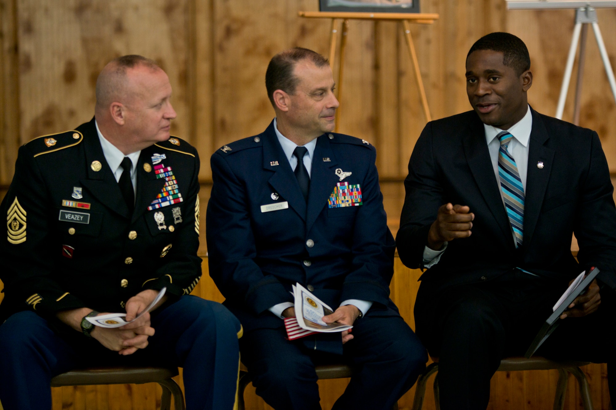 Command Sgt. Maj. Steven C. Veazey, senior enlisted leader, Arkansas Army National Guard, U.S. Air Force Reserve Col. Craig Drescher, commander, 913th Airlift Group and Mr. Isaac Henry, representing the City of North Little Rock Mayor’s office, converse before the start of the 11th Annual Tribute to Fallen Heroes Ceremony in Sherwood, Ark., Apr. 9, 2016.  The annual ceremony honors the memory of all Arkansans whom have fallen during the war against terrorism.  (U.S. Air Force photo by Master Sgt. Jeff Walston/released) 