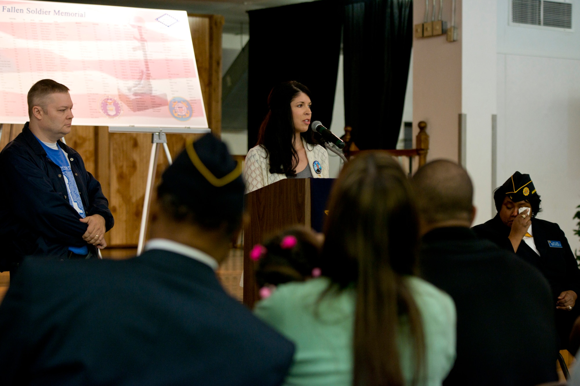Mrs. Jennifer Legate, daughter of Army National Guard Chief Warrant Officer 4, Patrick W. Kordsmeier, speaks about her father to the audience at the 11th Annual Tribute to Fallen Heroes Ceremony in Sherwood, Ark., Apr. 9, 2016. CW4 Kordsmeier died Apr. 24, 2004, in Taji, Iraq, when mortar rounds hit his camp. (U.S. Air Force photo by Master Sgt. Jeff Walston/released)
