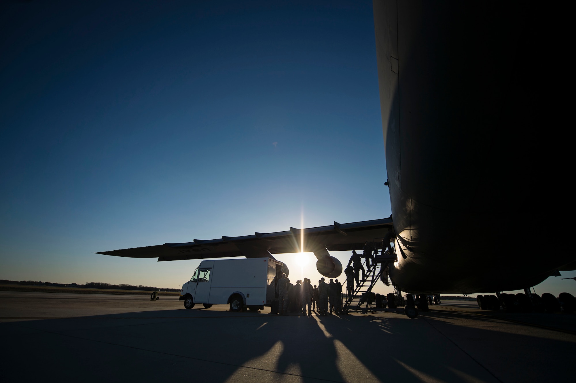 Reservists from Dover Air Force Base, Del., in the 512th Airlift Wing, load equipment onto a Team Dover C-5M Super Galaxy, March 29, 2016 at Joint Base McGuire-Dix-Lakehurst prior to Liberty Sands. The 512th AW's 709th Airlift Squadron conducted an off-station training exercise at Naval Air Station Pensacola, Fla., March 29 through April 3 to ensure they are current in all their deployment requirements. (U.S. Air Force photo/Capt. Bernie Kale)