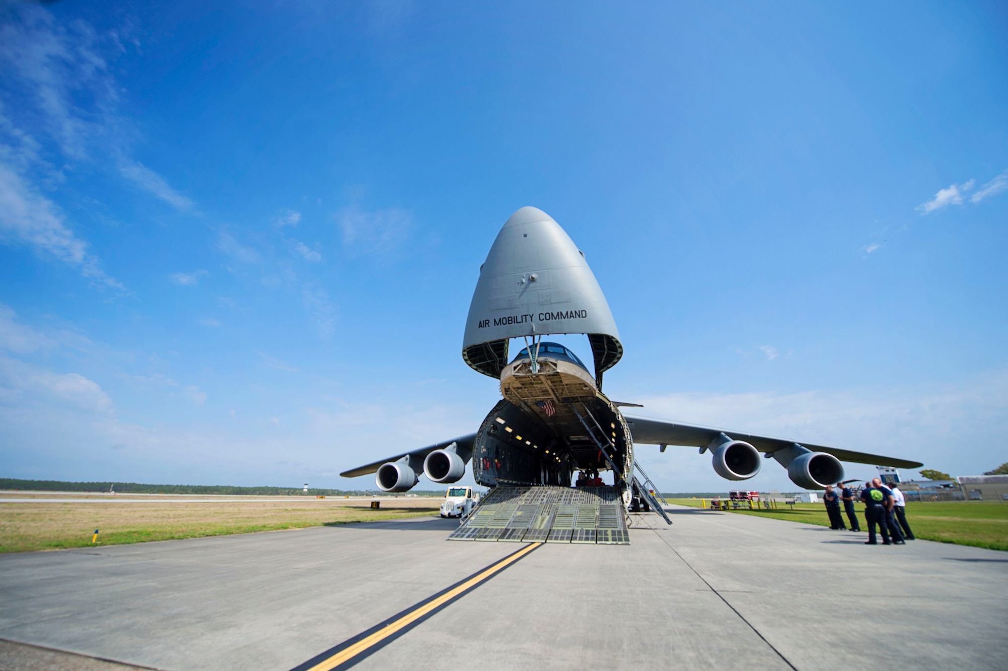 A Team Dover C-5M Super Galaxy sits on the flight line at Naval Air Station Pensacola, Fla., April 1, 2016. Reservists from Dover Air Force Base, Del., in the 512th Airlift Wing, conducted an off-station training exercise March 29 through April 3 to ensure they are current in all their deployment requirements. (U.S. Air Force photo/Capt. Bernie Kale)