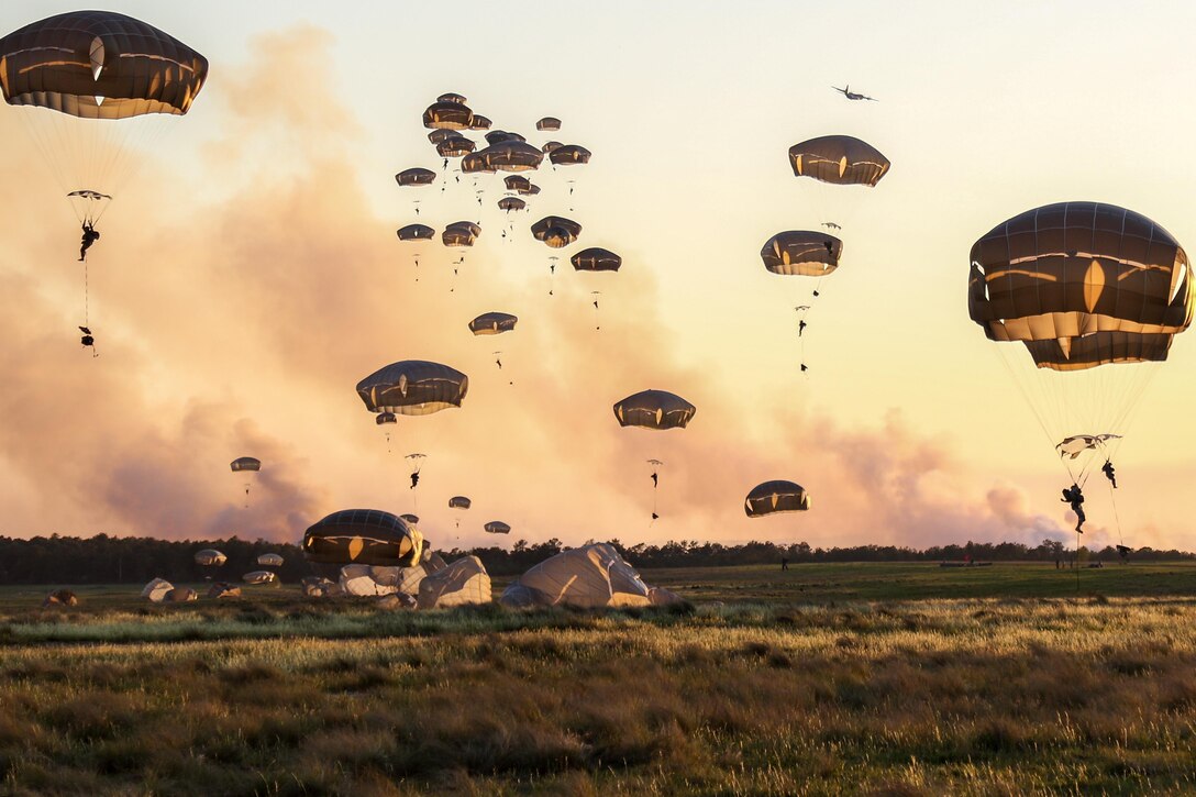 Army paratroopers conduct a joint forcible entry operation during a field training exercise at Fort Bragg, N.C., April 5, 2016. The paratroopers are assigned to the 82nd Airborne Division's 2nd Brigade Combat Team. Army photo by Staff Sgt. Jason Hull