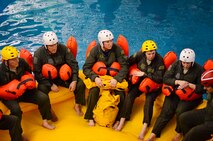 Reservists from the 709th Airlift Squadron, Dover Air Force Base, Del., conducted an off-station training exercise at Naval Air Station Pensacola, Fla., March 29 to April 3, 2016,  to ensure their deployment requirements are current. Air Force Reserve members from 14 different career fields trained in mission readiness, combat-related areas and worked together to build wingmanship and teamwork. (U.S. Air Force photo/Capt. Bernie Kale)