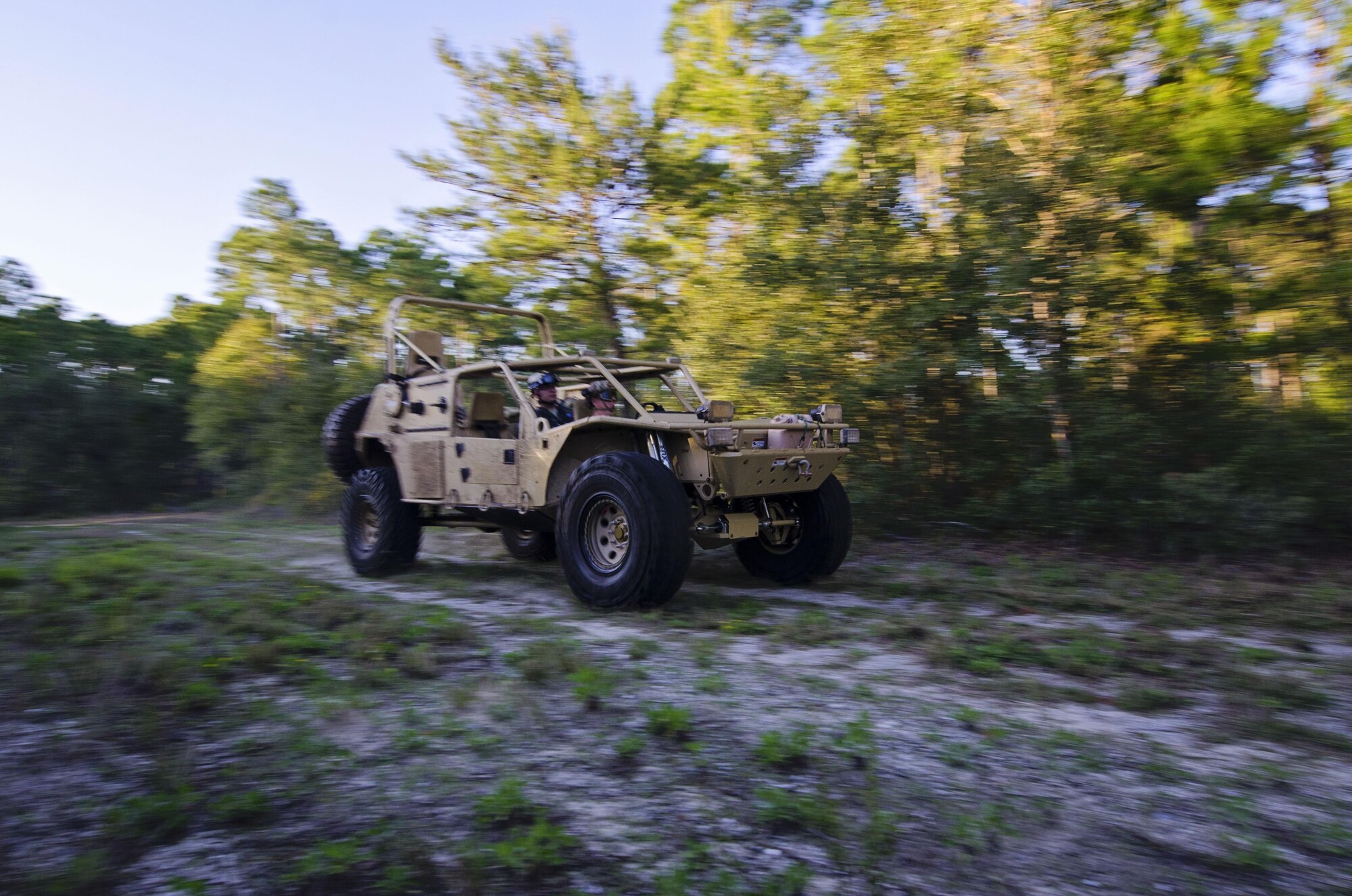 The driver of a Guardian Angel Air Deployable Rescue Vehicle drives on the off-road trail while rescuing simulated escaped prisoners of war in the swamps at Naval Air Station Pensacola, Fla., April 2, 2016. Reservists from Dover Air Force Base, Del., in the 512th Airlift Wing's 709th Airlift Squadron, conducted an off-station training exercise, March 29 through April 3, to ensure they are current in all their deployment requirements. (U.S. Air Force photo/Capt. Bernie Kale