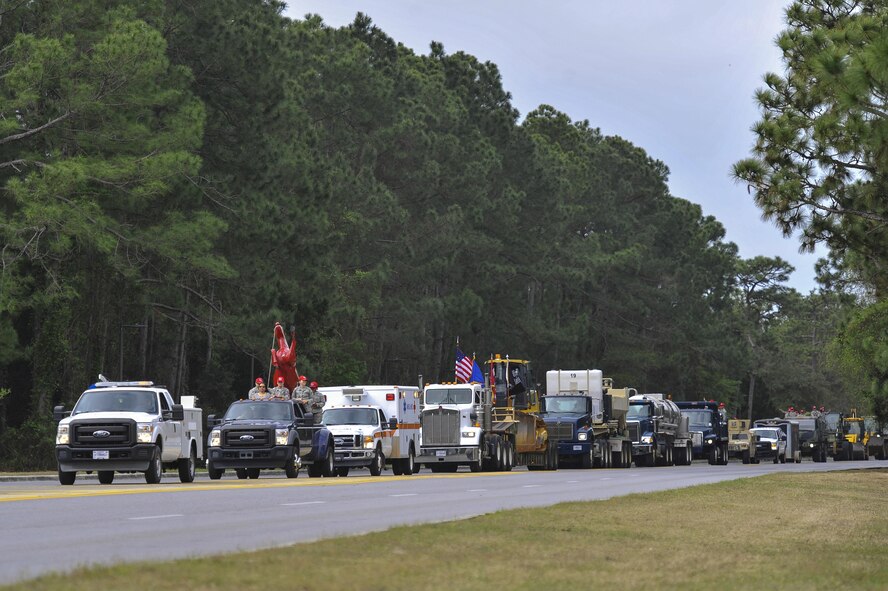 Airmen with the 823rd RED HORSE Squadron celebrate the squadron’s 50th anniversary with a parade and open house at Hurlburt Field, Fla., April 6, 2016. The RED HORSE squadron held an open house at their compound to showcase their mission to family, friends and former RED HORSE members. (U.S. Air Force photo by Airman 1st Class Kai White)