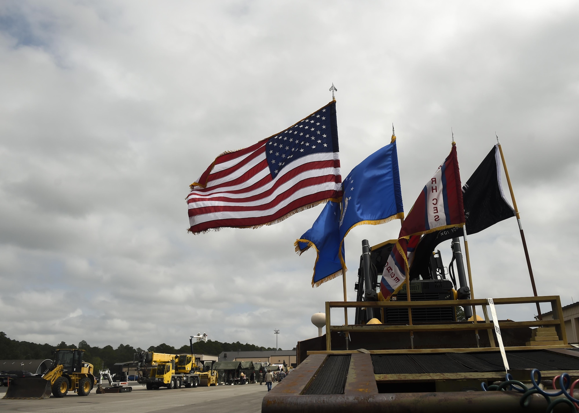 The 823rd RED HORSE Squadron holds an open house to celebrate the squadron’s 50th anniversary featuring a parade and static displays of equipment at Hurlburt Field, Fla., April 6, 2016. The RED HORSE squadron held an open house at their compound to showcase their mission to family, friends and former RED HORSE members. (U.S. Air Force photo by Airman 1st Class Kai White)