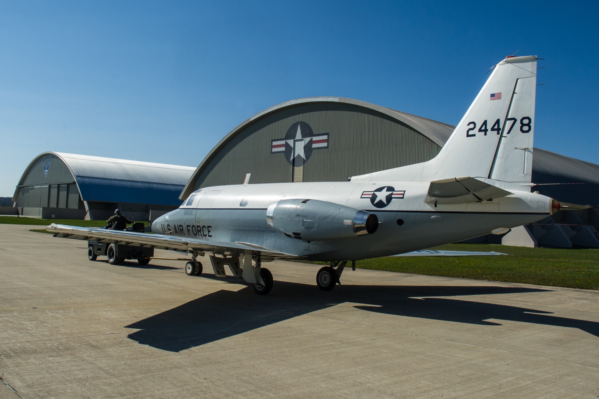 DAYTON, Ohio -- The North American T-39A Sabreliner being towed into the fourth building at the National Museum of the United States Air Force on April 12, 2016. This aircraft is one of ten Presidential aircraft in the collection. (U.S. Air Force photo by Ken LaRock)