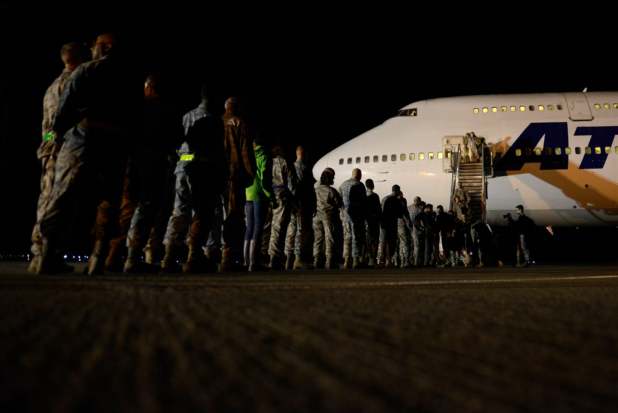 Team Shaw leadership create a greeting line to welcome home Airmen assigned to the 20th Fighter Wing at Shaw Air Force Base, S.C., April 13, 2016. Approximately 300 Airmen returned after deploying to the United States Central Command Area of Responsibility for six months. (U.S. Air Force photo by Airman 1st Class Christopher Maldonado)
